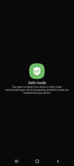 Android Safe mode screen prompting to tap to restart in Safe mode. Android Safe mode screen prompting to tap to restart in Safe mode.