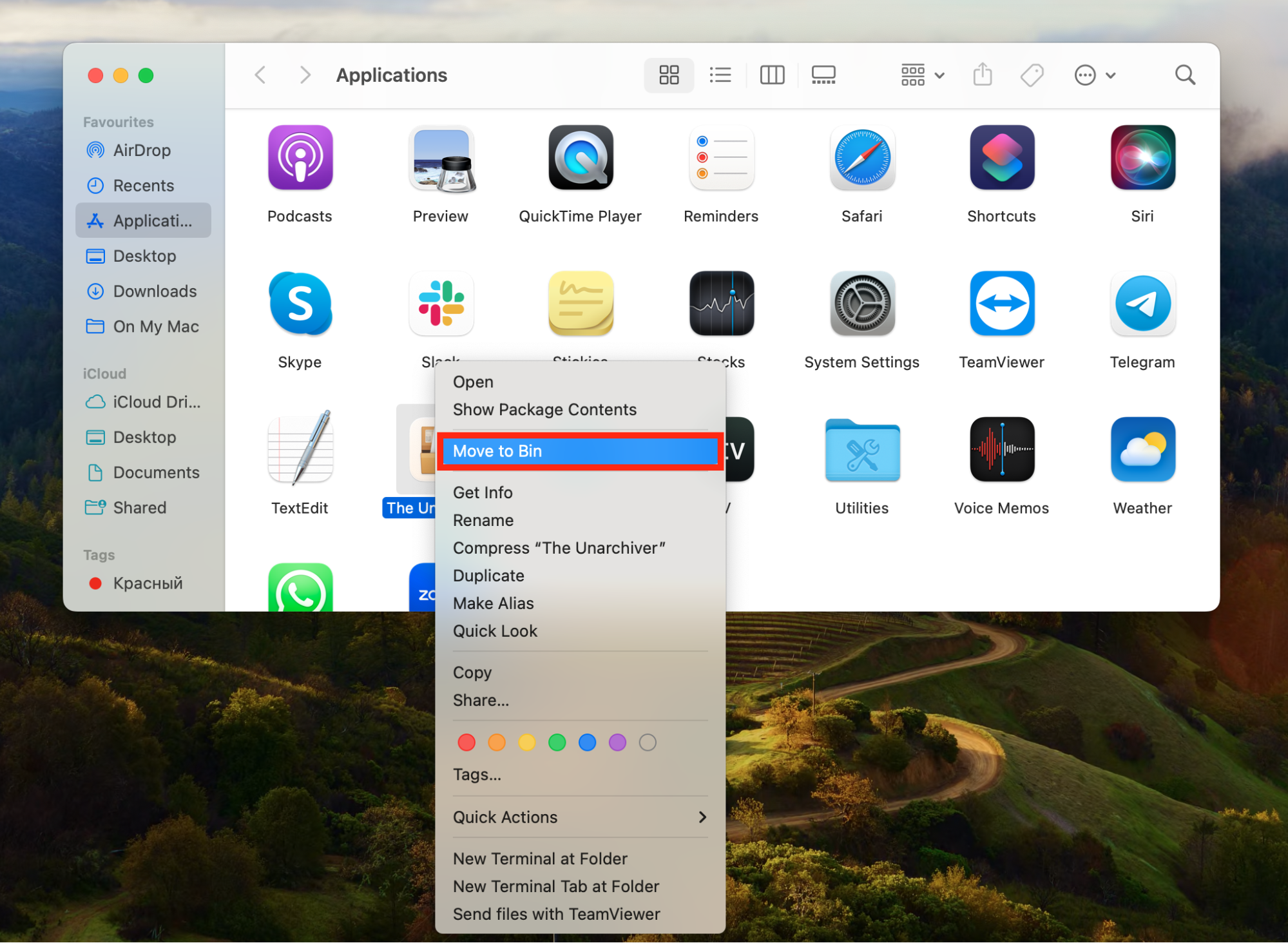 A screenshot of the applications window showing how to move an app to the bin to remove malware from Mac. A screenshot of the applications window showing how to move an app to the bin to remove malware from Mac.