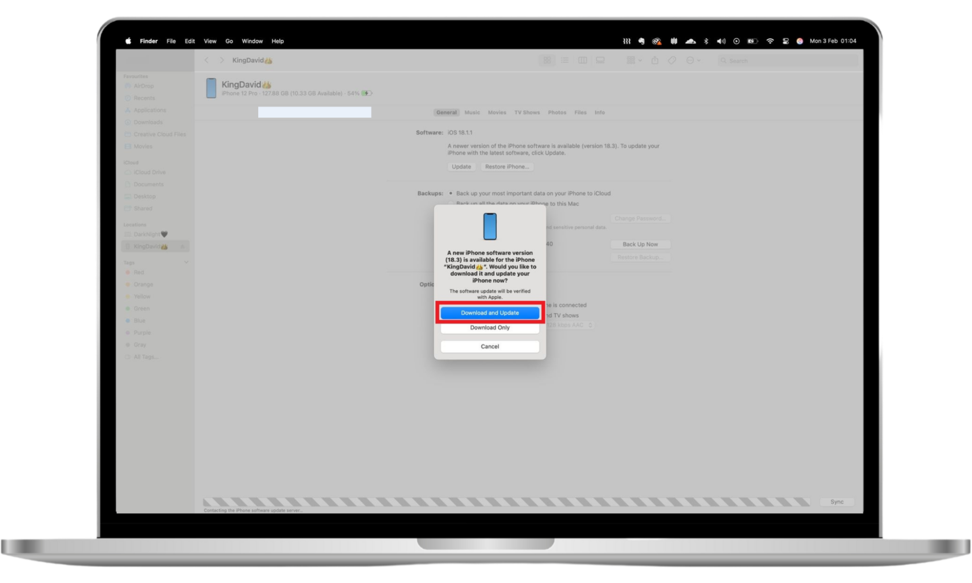 Finder showing the Download and Update prompt for installing the latest iOS version on an iPhone. Finder showing the Download and Update prompt for installing the latest iOS version on an iPhone.