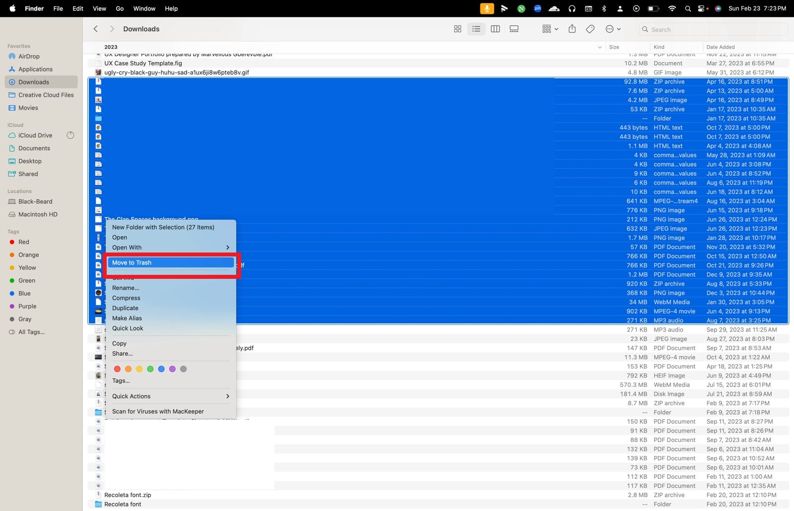 macOS Downloads folder with multiple files selected and the Move to Trash option highlighted, showing how to check if your Mac has a virus or malware macOS Downloads folder with multiple files selected and the Move to Trash option highlighted, showing how to check if your Mac has a virus or malware