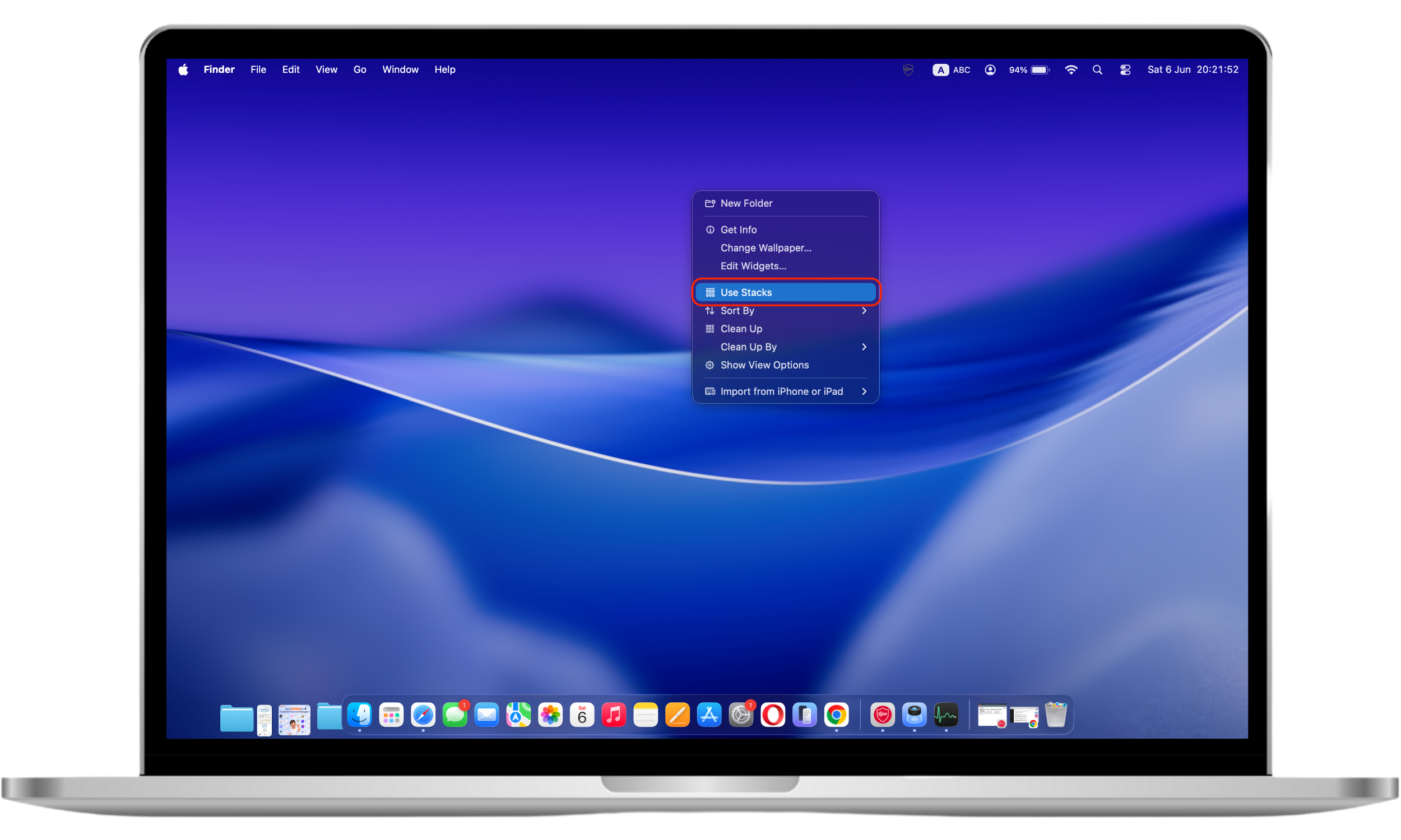 A desktop context menu on a Mac displays the Use Stacks option, allowing users to group files into organized categories and reduce desktop clutter.