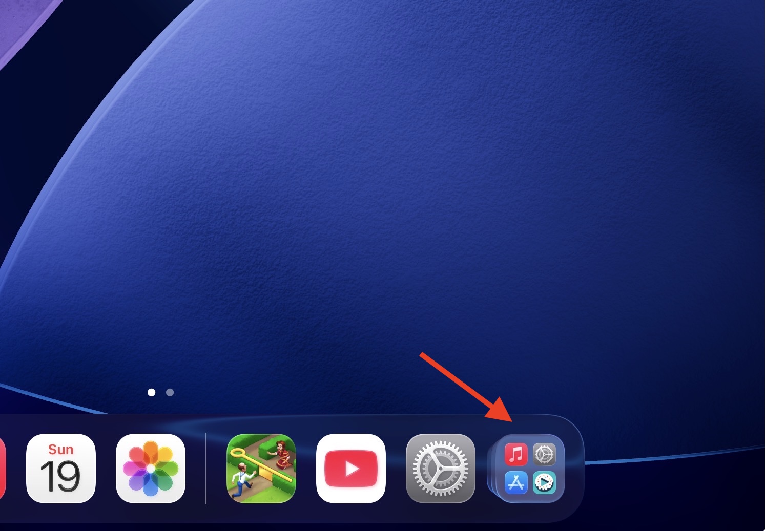 An iPad screen shows the App Library icon located on the right side of the Dock.