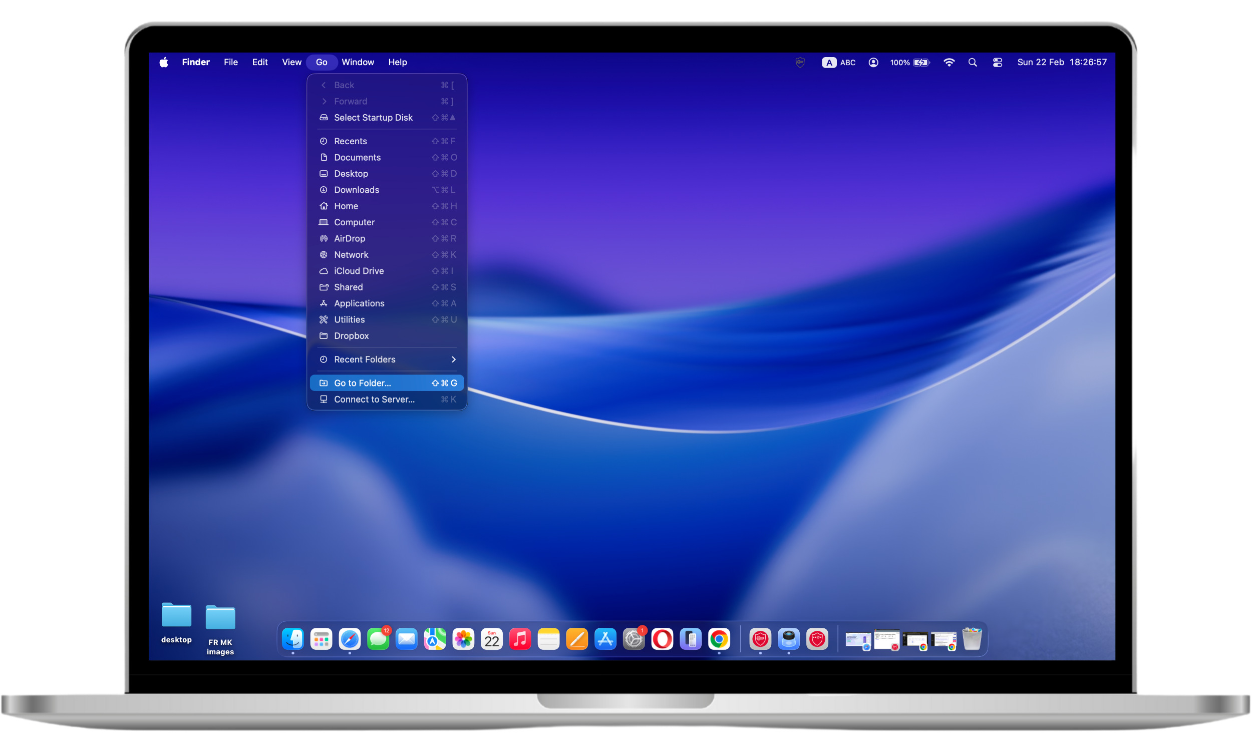 Finder menu open on Mac with the Go dropdown expanded and Go to Folder option selected to access system folders.