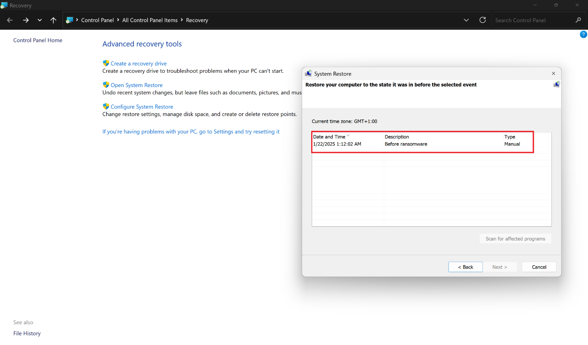 System Restore window on Windows 11 listing restore points, with a highlighted point labeled 'Before ransomware. System Restore window on Windows 11 listing restore points, with a highlighted point labeled 'Before ransomware.
