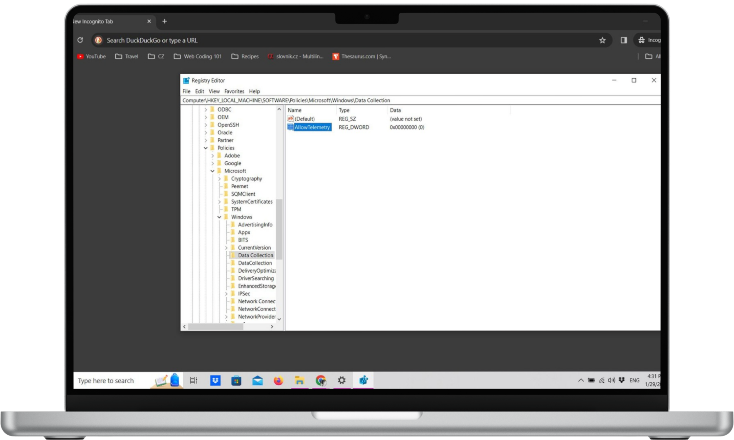 Registry Editor window with Allow Telemetry DWORD in Data Collection Registry Editor window with Allow Telemetry DWORD in Data Collection